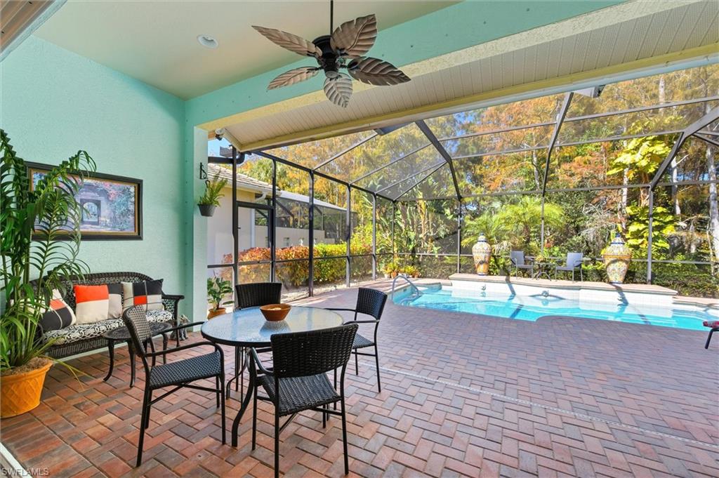3033 Olde Cove Way Naples, FL 34119 - Photo 40 of 49 Patio area in meticulous condition
