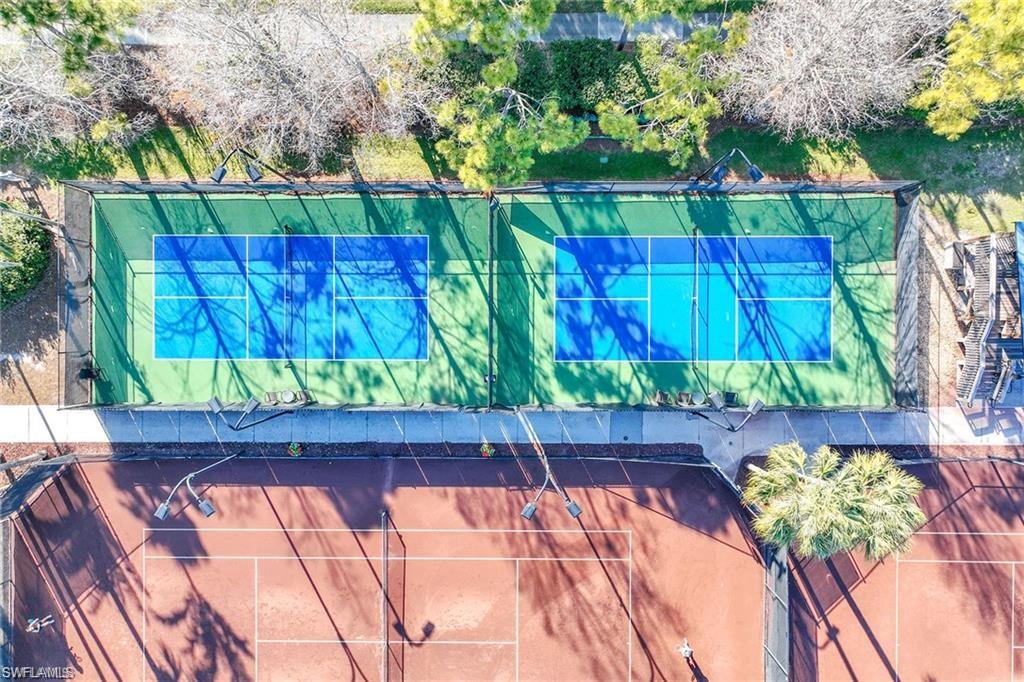 3033 Olde Cove Way Naples, FL 34119 - Photo 48 of 49 Pickleball and Tennis Courts behind Fitness Center