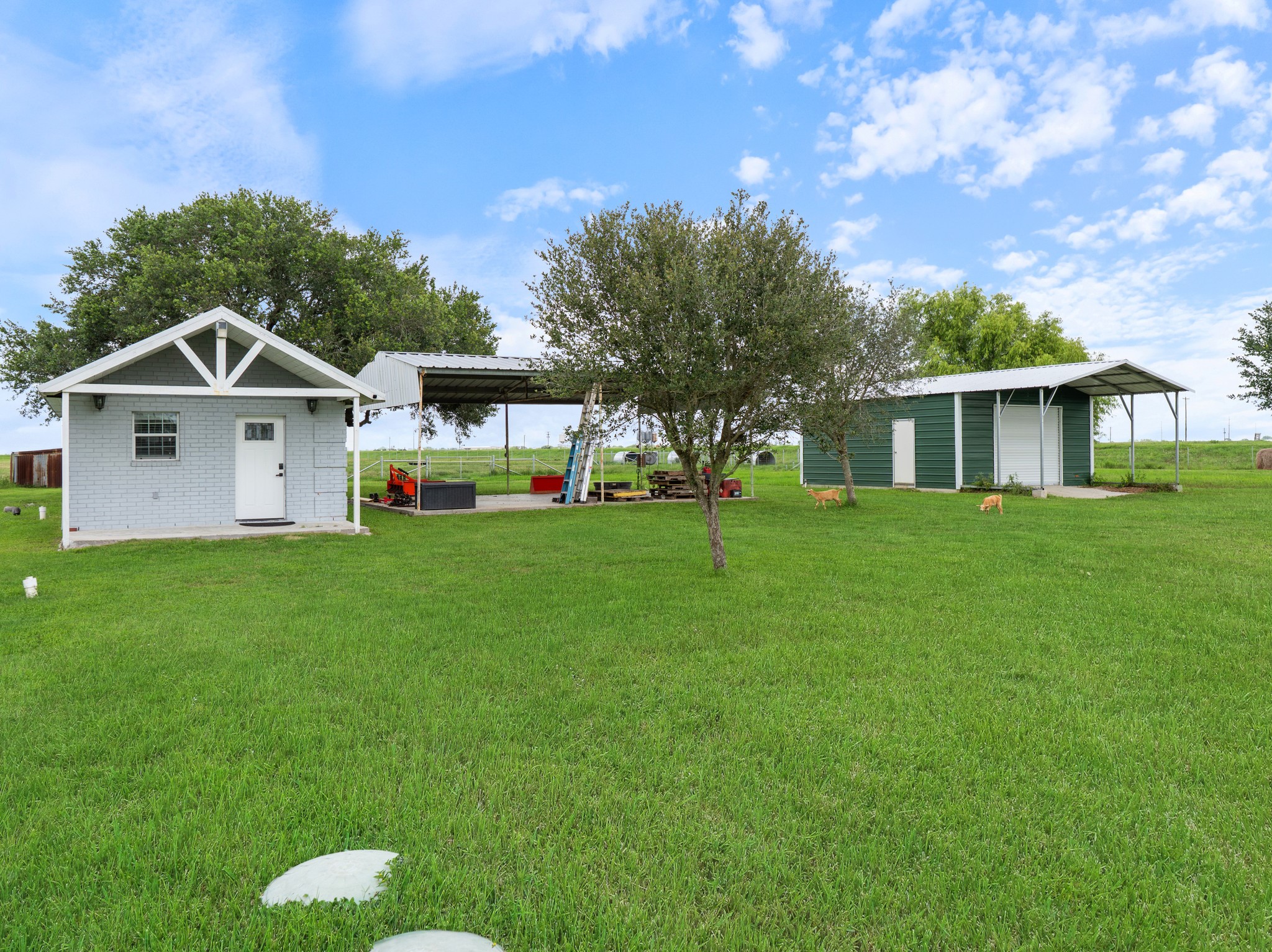 11301 South FM 441 Road El Campo, TX 77437 - Photo 20 of 32 The guest house features a covered front porch to relax and enjoy the great outdoors. There is also covered parking.