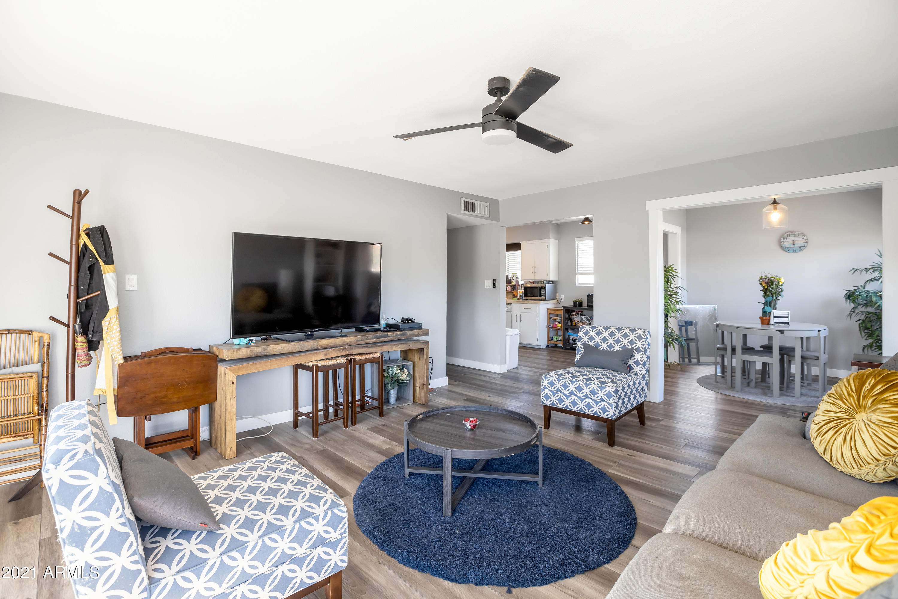 4101 East Camelback Road, Unit 15 Phoenix, AZ 85018 - Photo 5 of 20 Living Room into dining and kitchen