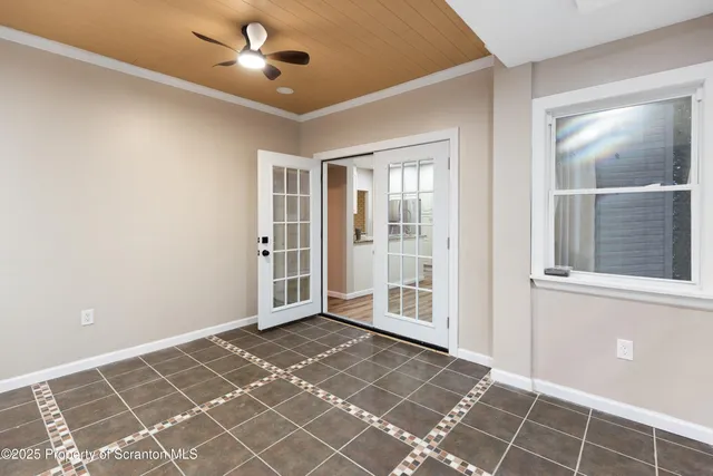 a bathroom with a sink mirror and a bathtub