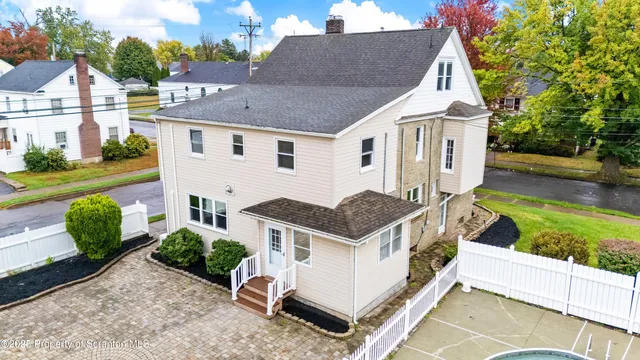 a view of a swimming pool with a lake