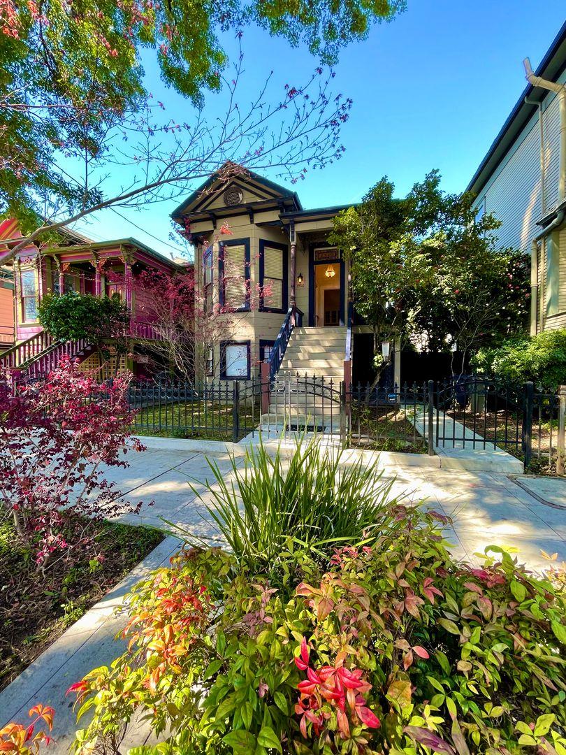 1510 19th Street Sacramento, CA 95811 - Photo 1 of 18 a front view of a house with a yard