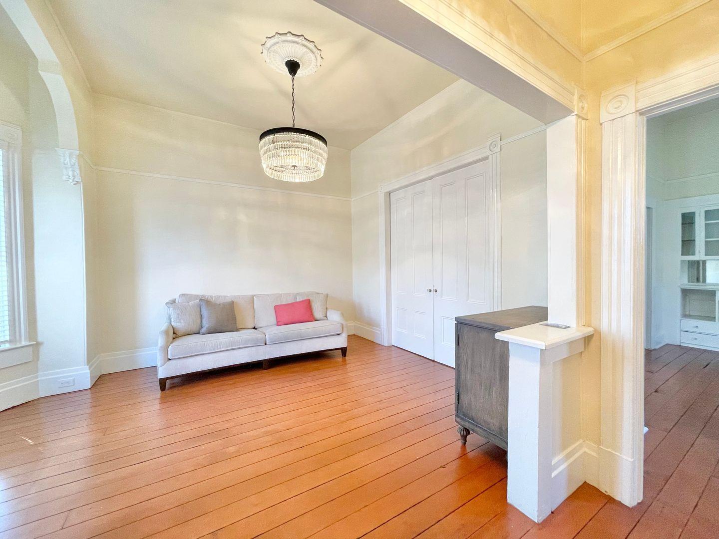 1510 19th Street Sacramento, CA 95811 - Photo 4 of 18 a living room with furniture and wooden floor