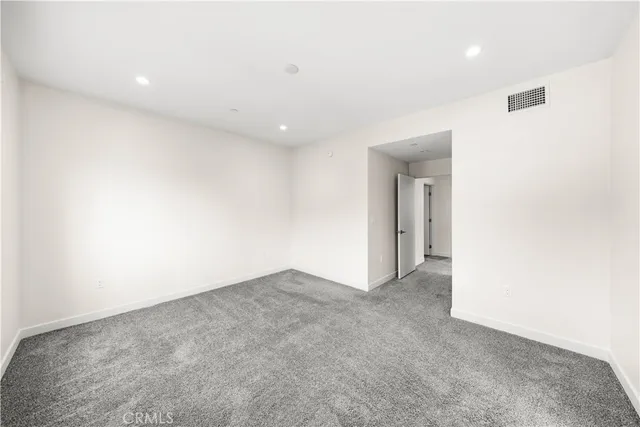 an empty room with an entryway