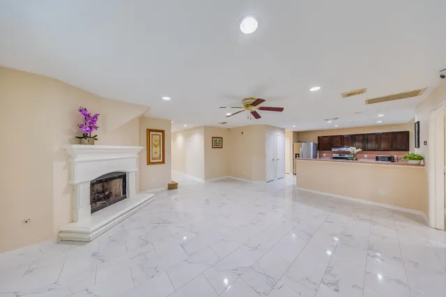 a view of a livingroom with furniture and window