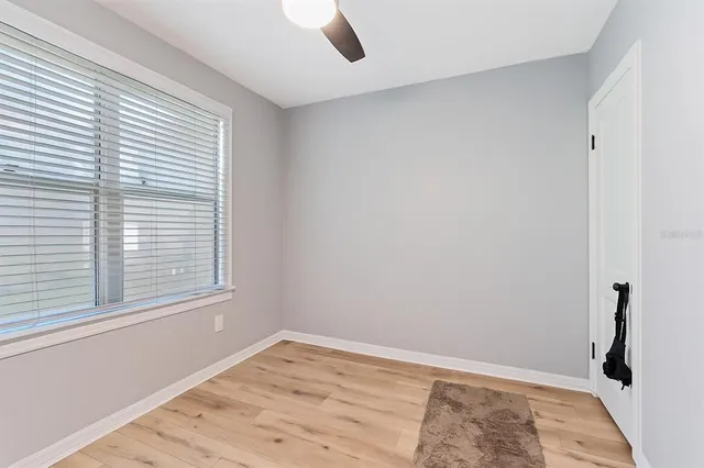 a view of an empty room and window