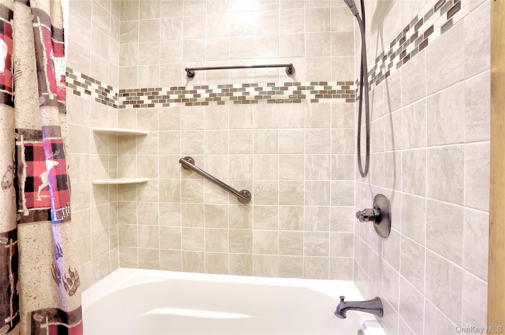 310 South Mountain Road New City, NY 10956 - Photo 16 of 27 a bathroom with a bathtub and shower