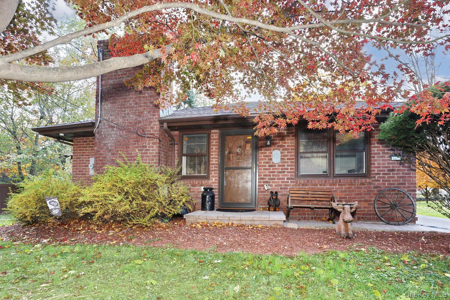 310 South Mountain Road New City, NY 10956 - Photo 4 of 27 a front view of a house with garden