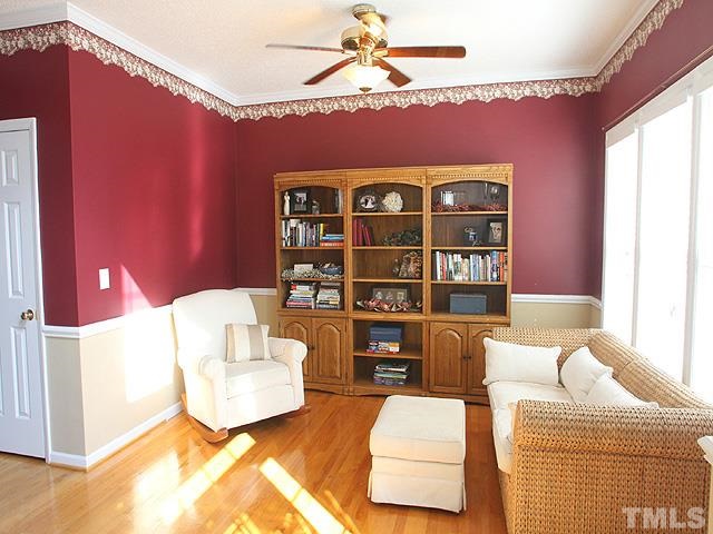 4908 Topstone Road Raleigh, NC 27603 - Photo 2 of 14 a living room with furniture and a window