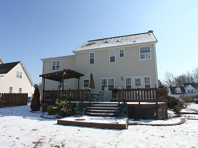 4908 Topstone Road Raleigh, NC 27603 - Photo 14 of 14 a view of a house with a patio