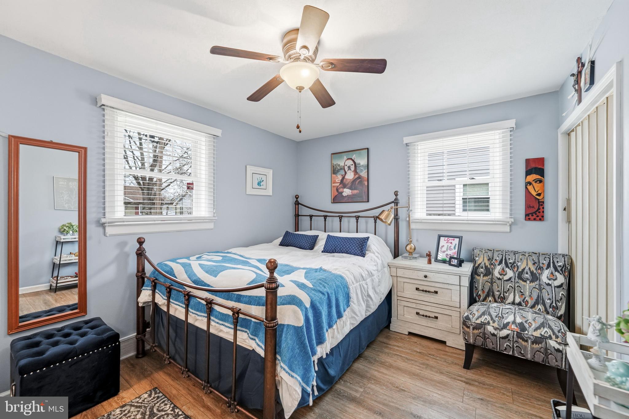 6 Woodbine Avenue Maple Shade, NJ 08052 - Photo 15 of 35 a bedroom with a bed and a chandelier