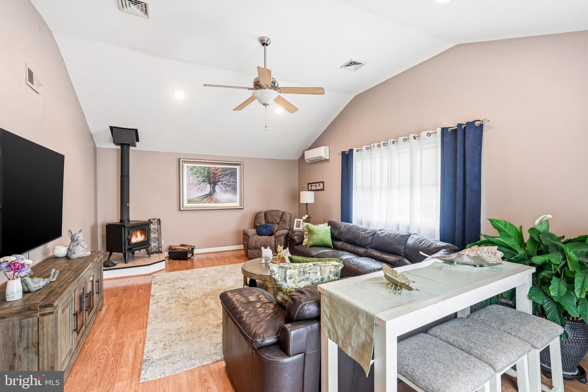6 Woodbine Avenue Maple Shade, NJ 08052 - Photo 19 of 35 a living room with furniture kitchen view and a large window