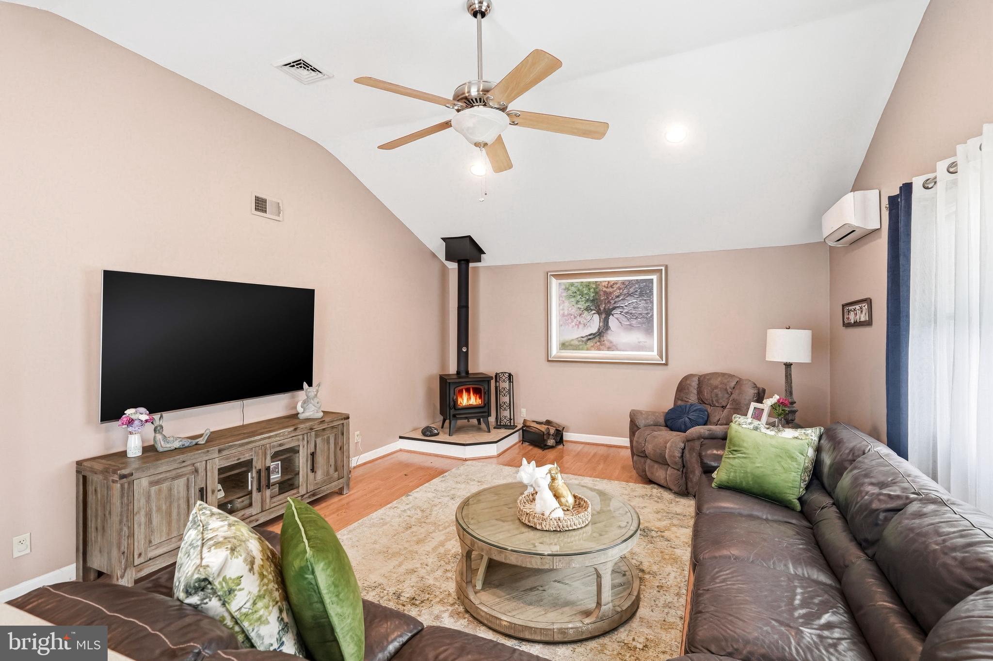 6 Woodbine Avenue Maple Shade, NJ 08052 - Photo 20 of 35 a living room with furniture and a flat screen tv
