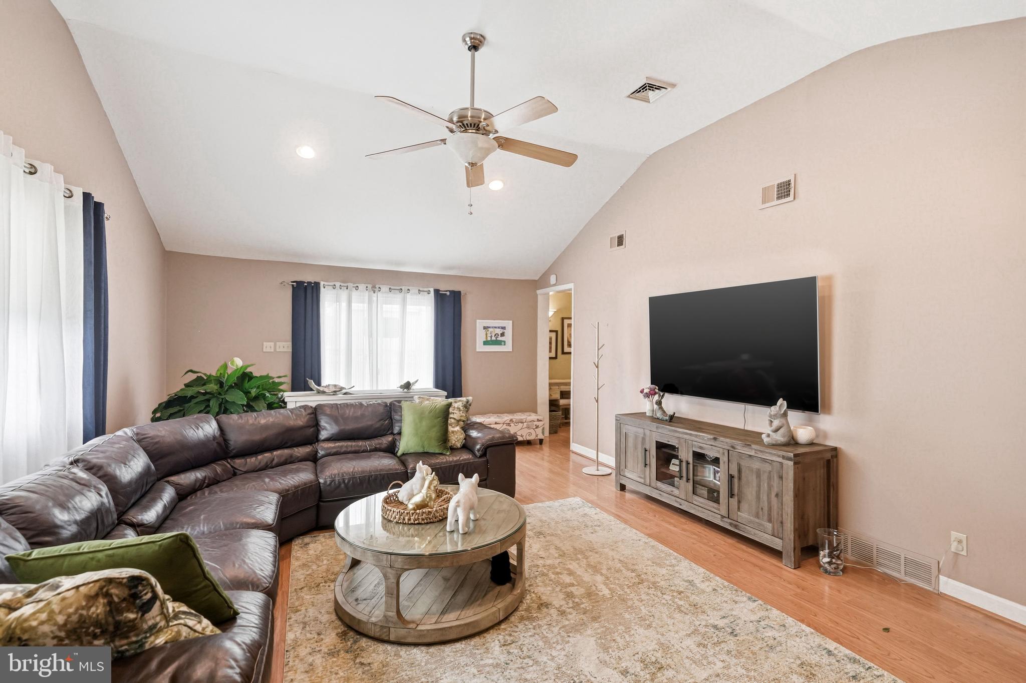 6 Woodbine Avenue Maple Shade, NJ 08052 - Photo 21 of 35 a living room with furniture and a flat screen tv