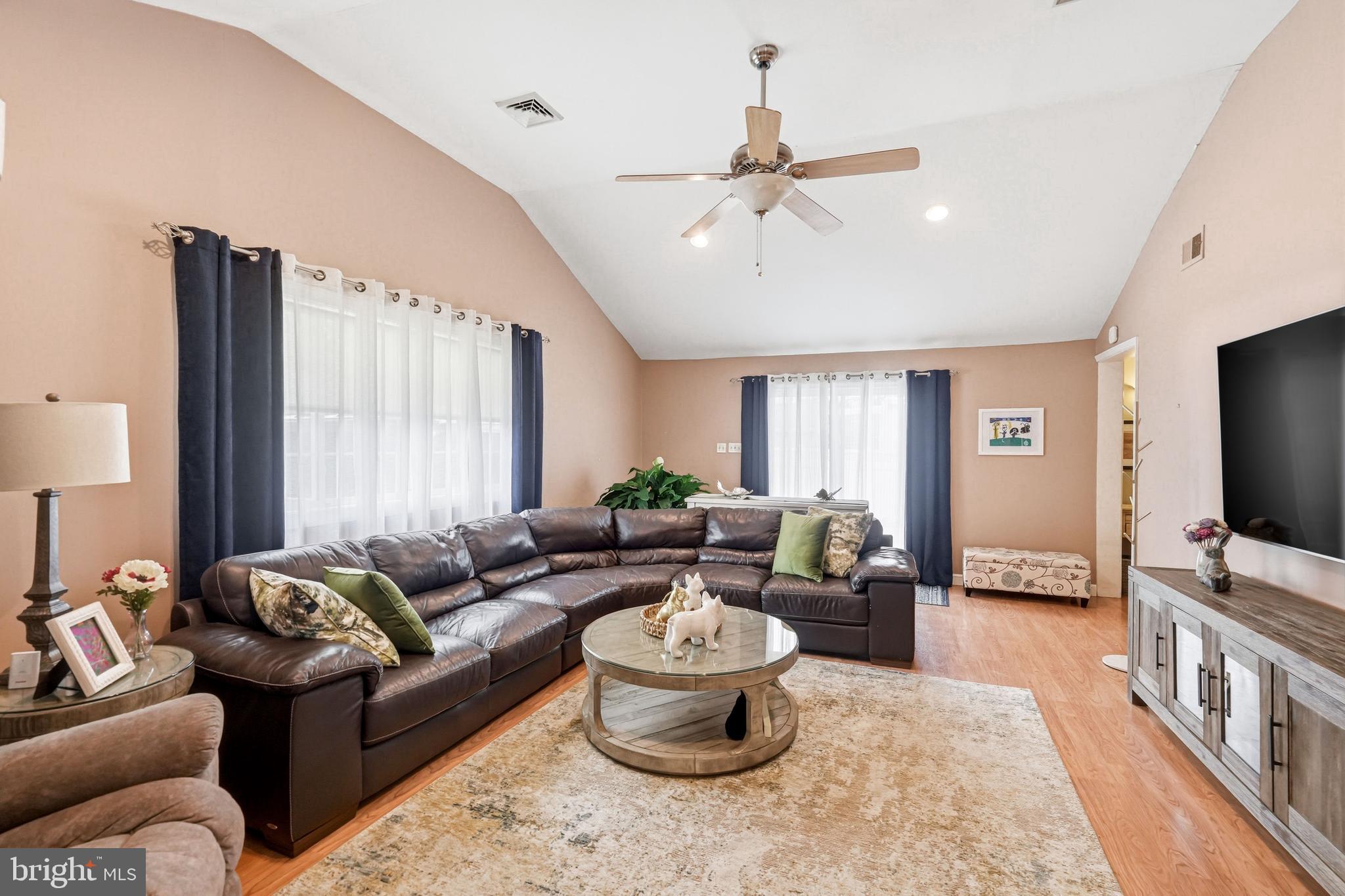 6 Woodbine Avenue Maple Shade, NJ 08052 - Photo 22 of 35 a living room with furniture and a flat screen tv