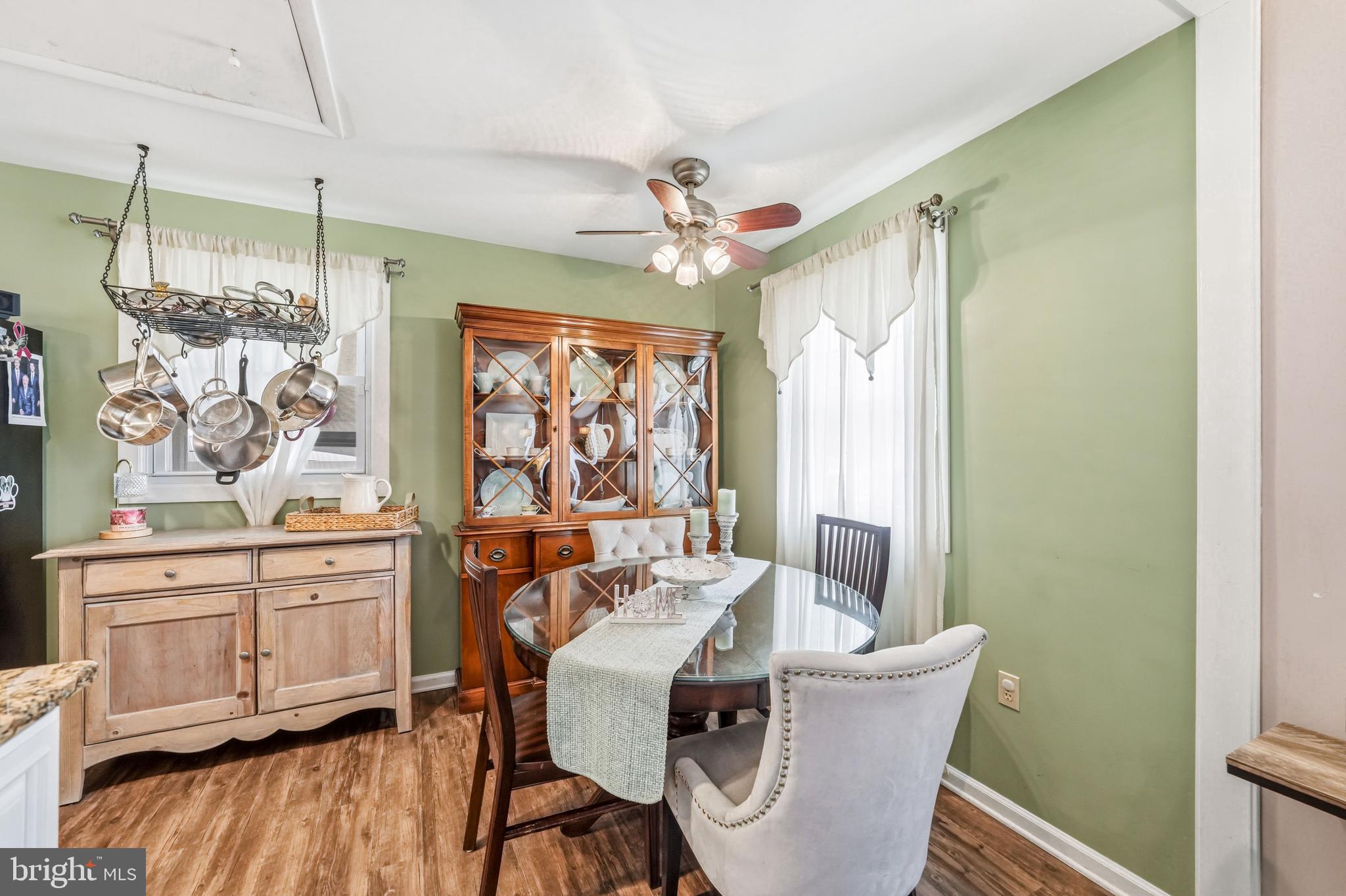 6 Woodbine Avenue Maple Shade, NJ 08052 - Photo 7 of 35 a dining room with furniture a chandelier and wooden floor