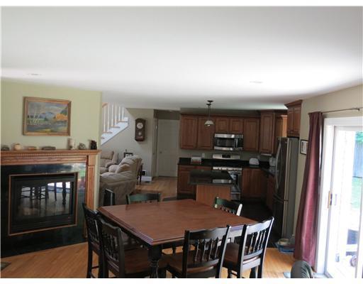 8 Burnham Road Scarborough, ME 04074 - Photo 6 of 25 Dining Room. Gas fireplace in the...