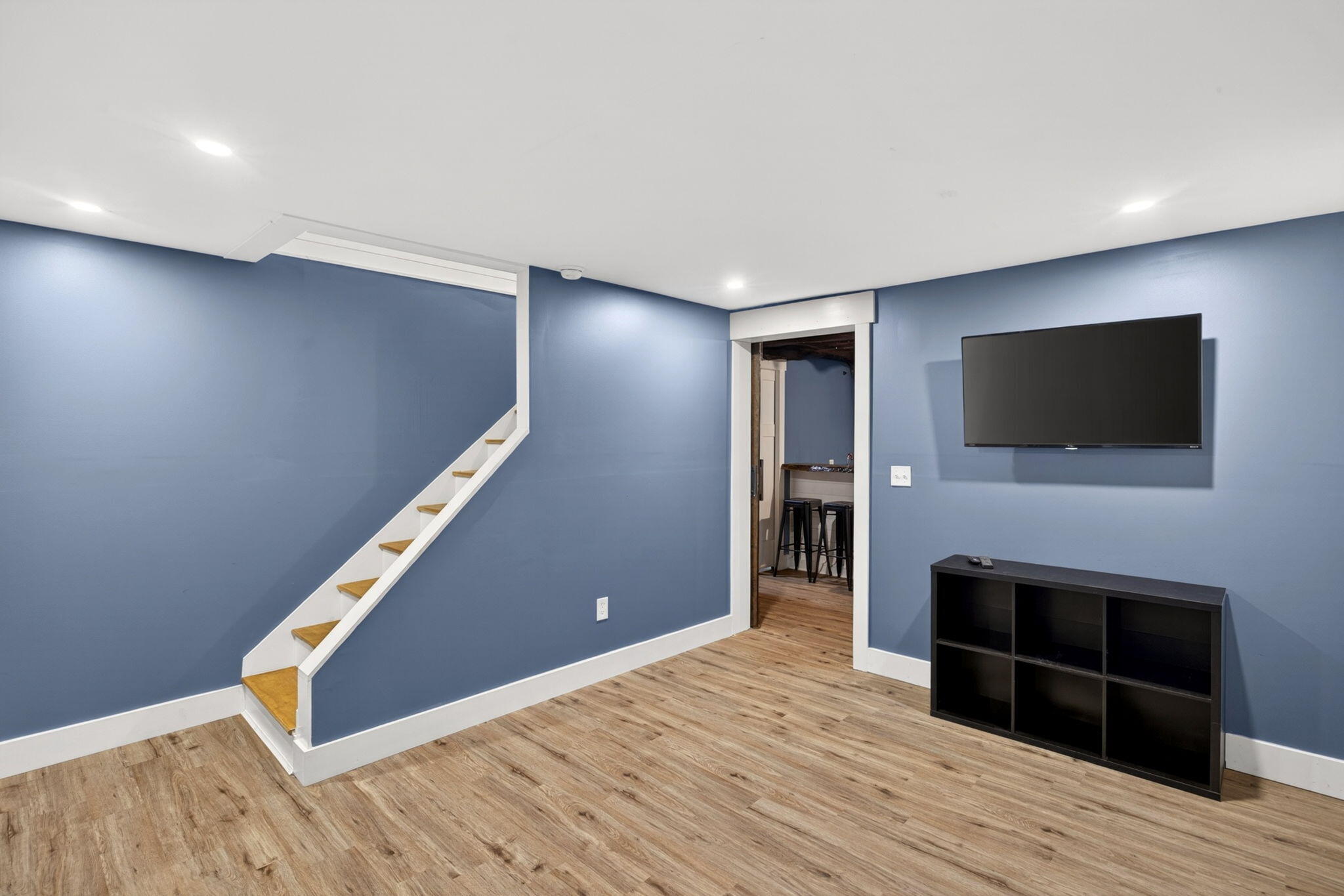 12 Sarah Lawrence Road Sandwich, MA 02563 - Photo 36 of 54 a view of a livingroom with an empty space and a hallway