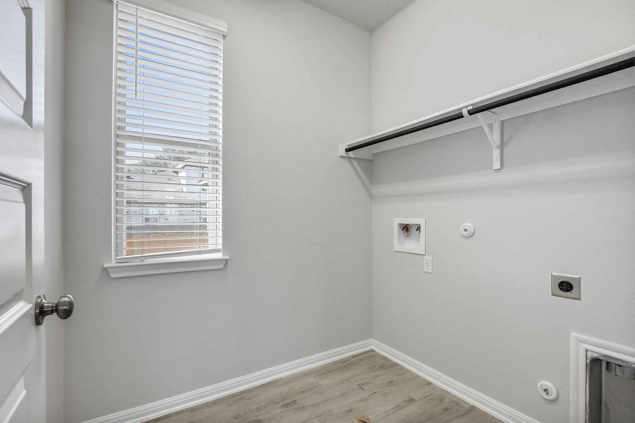 1220 Oak Chase Way Leander, TX 78641 - Photo 10 of 14 a view of a storage & utility room with a window