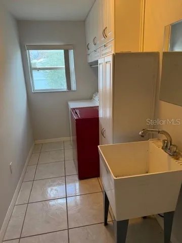 a room with a table and chairs