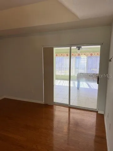 a view of an empty room and window