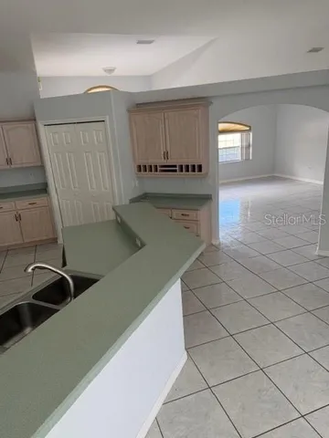 a view of a kitchen with a sink
