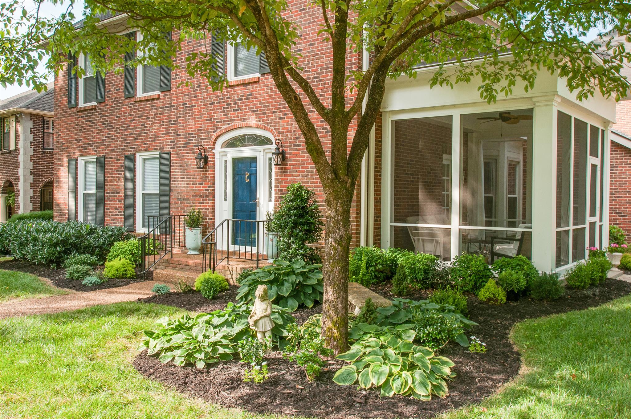 211 Mockingbird Road Nashville, TN 37205 - Photo 1 of 29 front view of a house with a yard