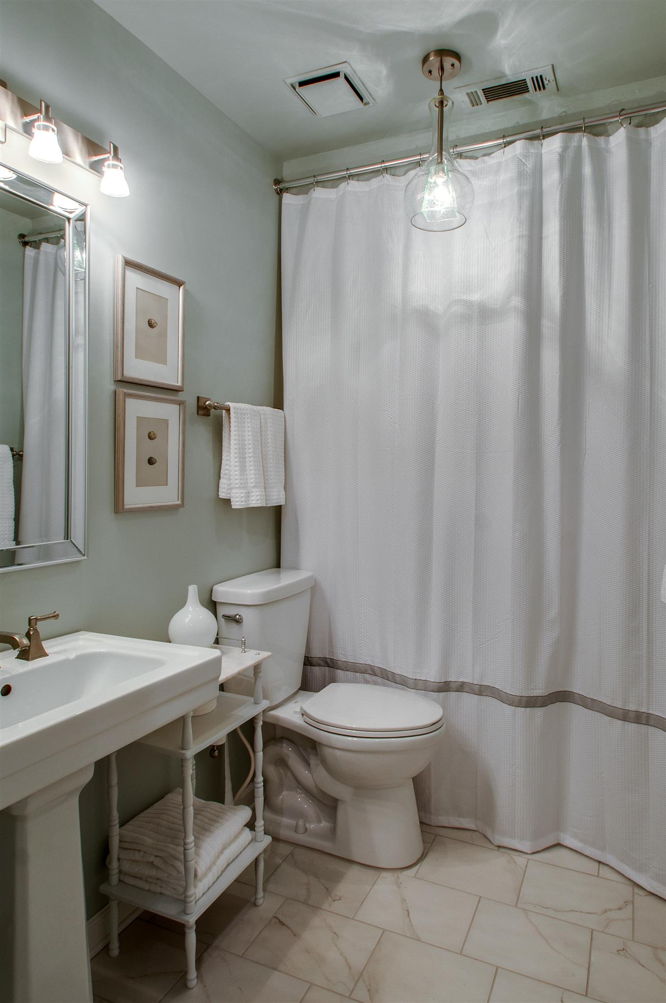 211 Mockingbird Road Nashville, TN 37205 - Photo 23 of 29 a bathroom with a sink toilet and shower