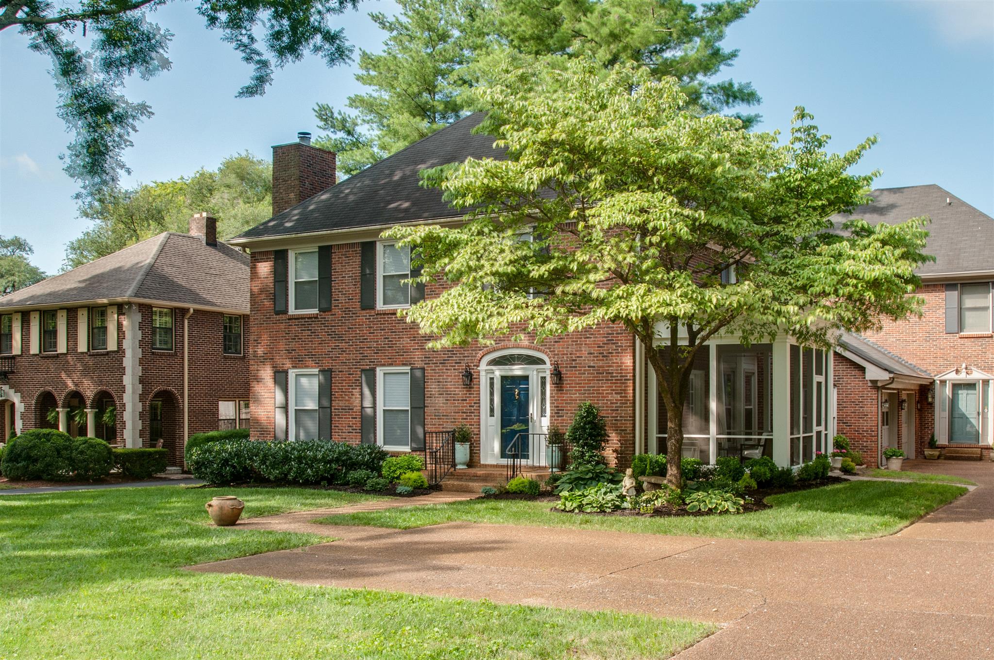 211 Mockingbird Road Nashville, TN 37205 - Photo 3 of 29 front view of a house with a yard