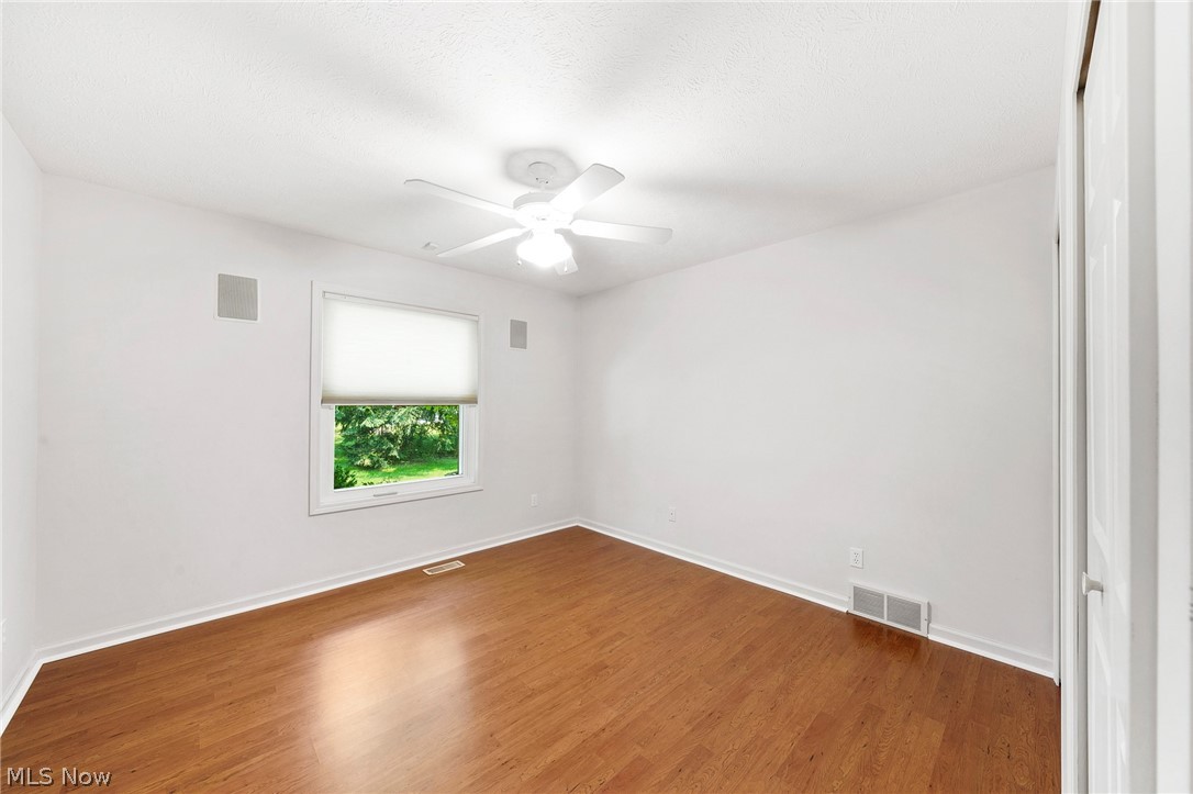 1763 Richmond Road Lyndhurst, OH 44124 - Photo 19 of 34 Bedroom 1 has laminate floors and custom shades.