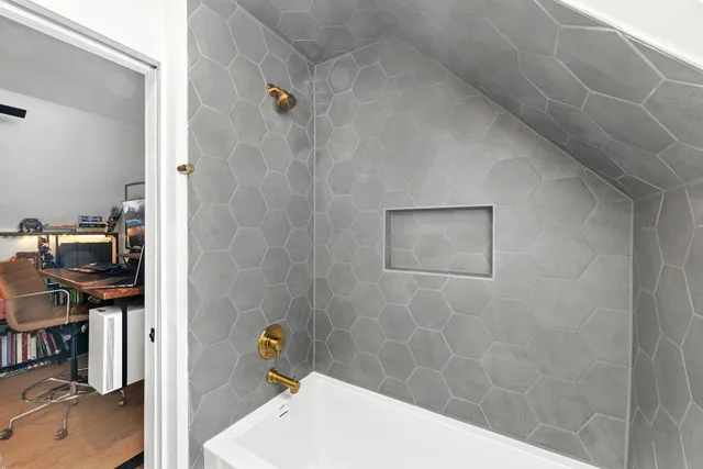 a bathroom with a sink and a window