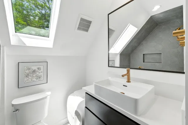 a bathroom with a sink and a toilet