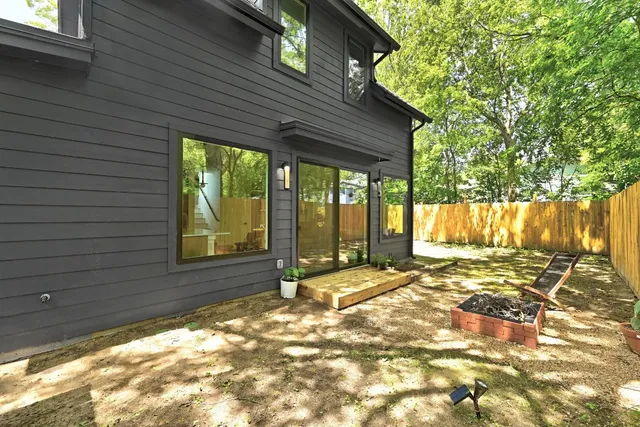 a view of a backyard of a house