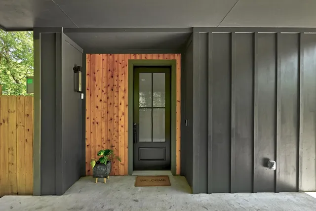 a view of entryway with a wooden door