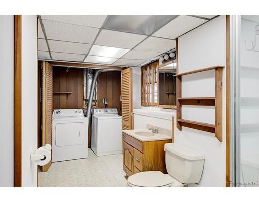 67 Ferry Road Salisbury, MA 01952 - Photo 15 of 25 a bathroom with a toilet sink and mirror
