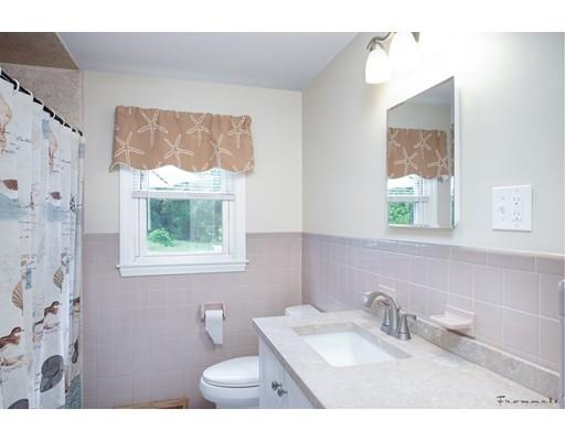 67 Ferry Road Salisbury, MA 01952 - Photo 8 of 25 a bathroom with a sink toilet and mirror