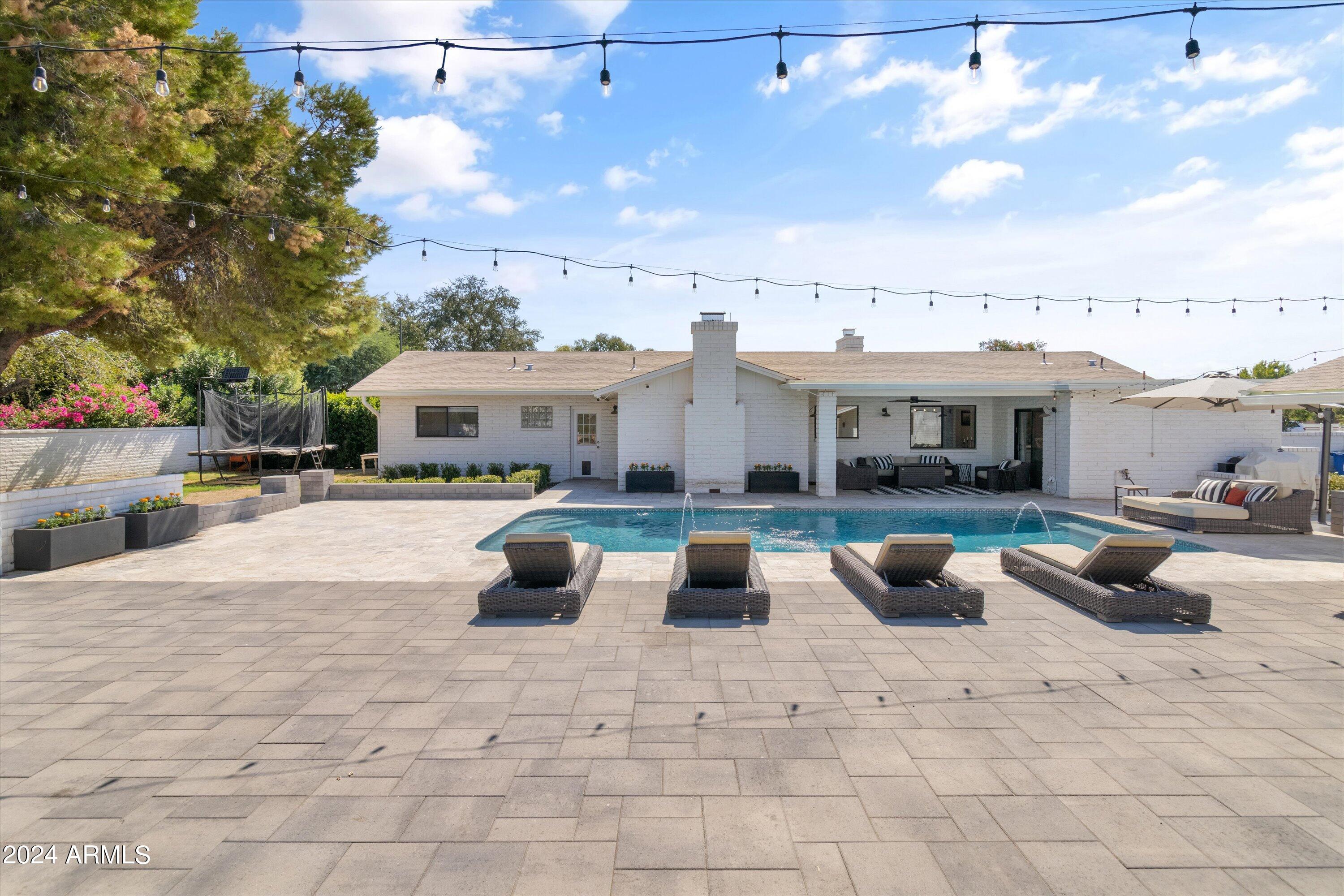 2216 East Willis Road Gilbert, AZ 85297 - Photo 24 of 50 3000 sq ft of travertine and pavers