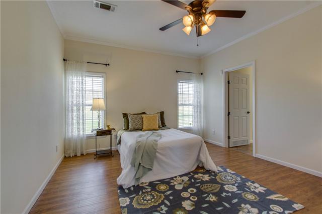120 Piney Road Dickson, TN 37055 - Photo 11 of 20 Large master suite with wood look laminate flooring.