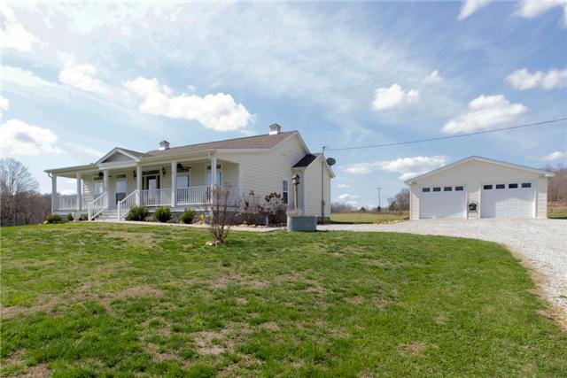 120 Piney Road Dickson, TN 37055 - Photo 3 of 20 NICE 2 car detached garage and workshop with electricity.