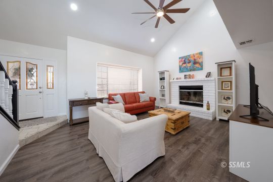 224 Richard Court Ridgecrest, CA 93555 - Photo 9 of 49 a living room with furniture and a fireplace
