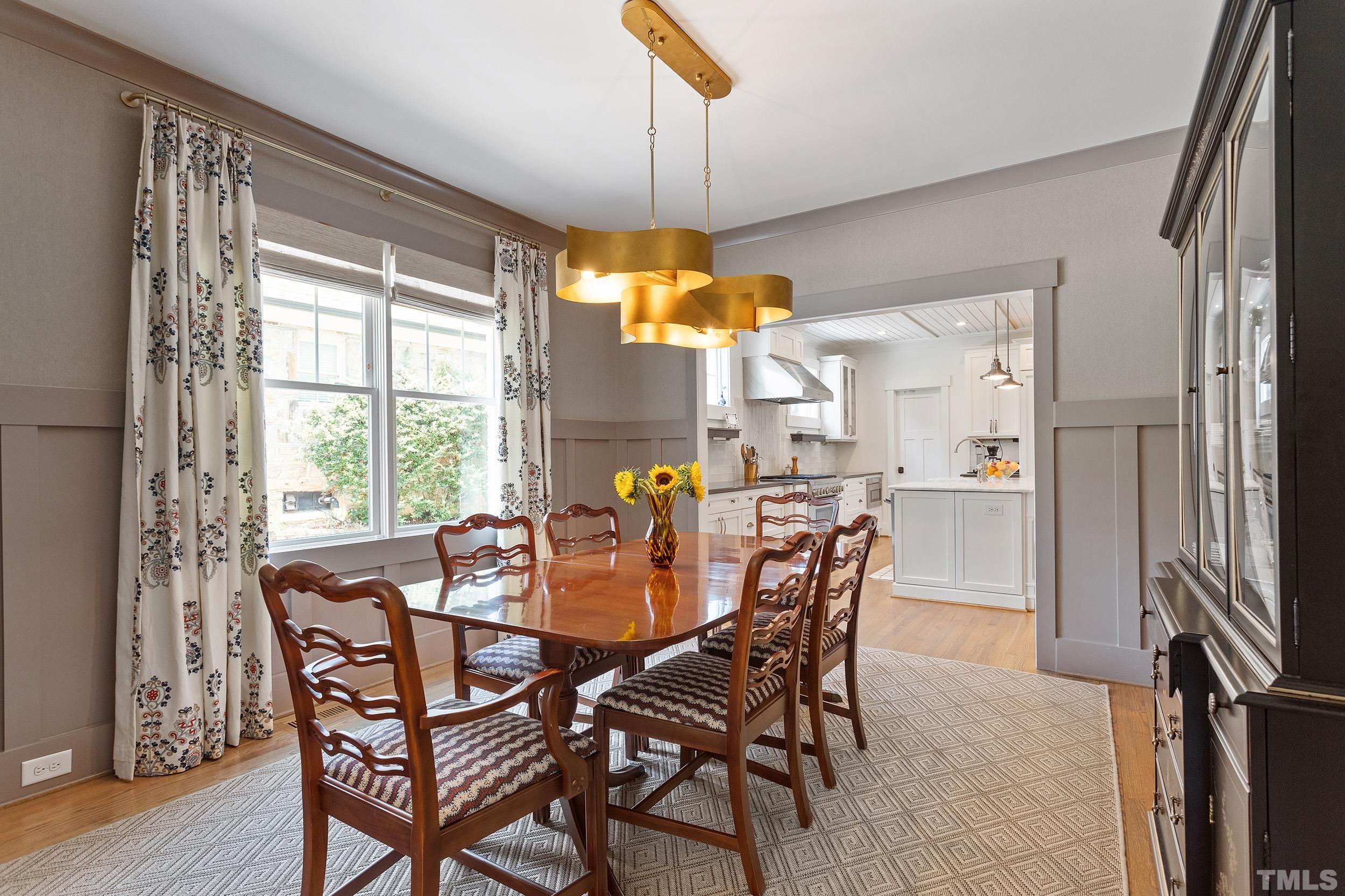 2511 Beechridge Road Raleigh, NC 27608 - Photo 12 of 45 a view of a dining room with furniture window and outside view