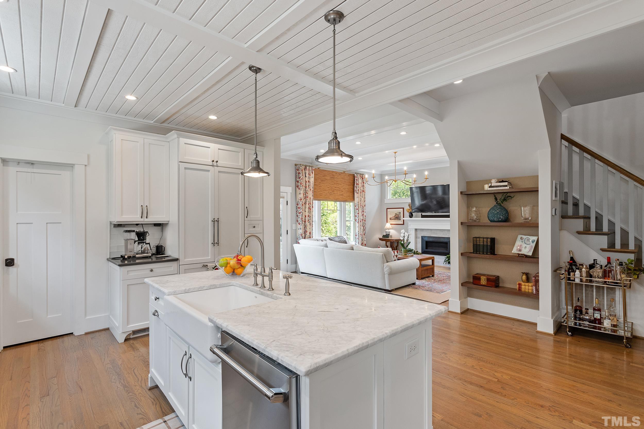2511 Beechridge Road Raleigh, NC 27608 - Photo 18 of 45 a kitchen with stainless steel appliances granite countertop a stove and refrigerator
