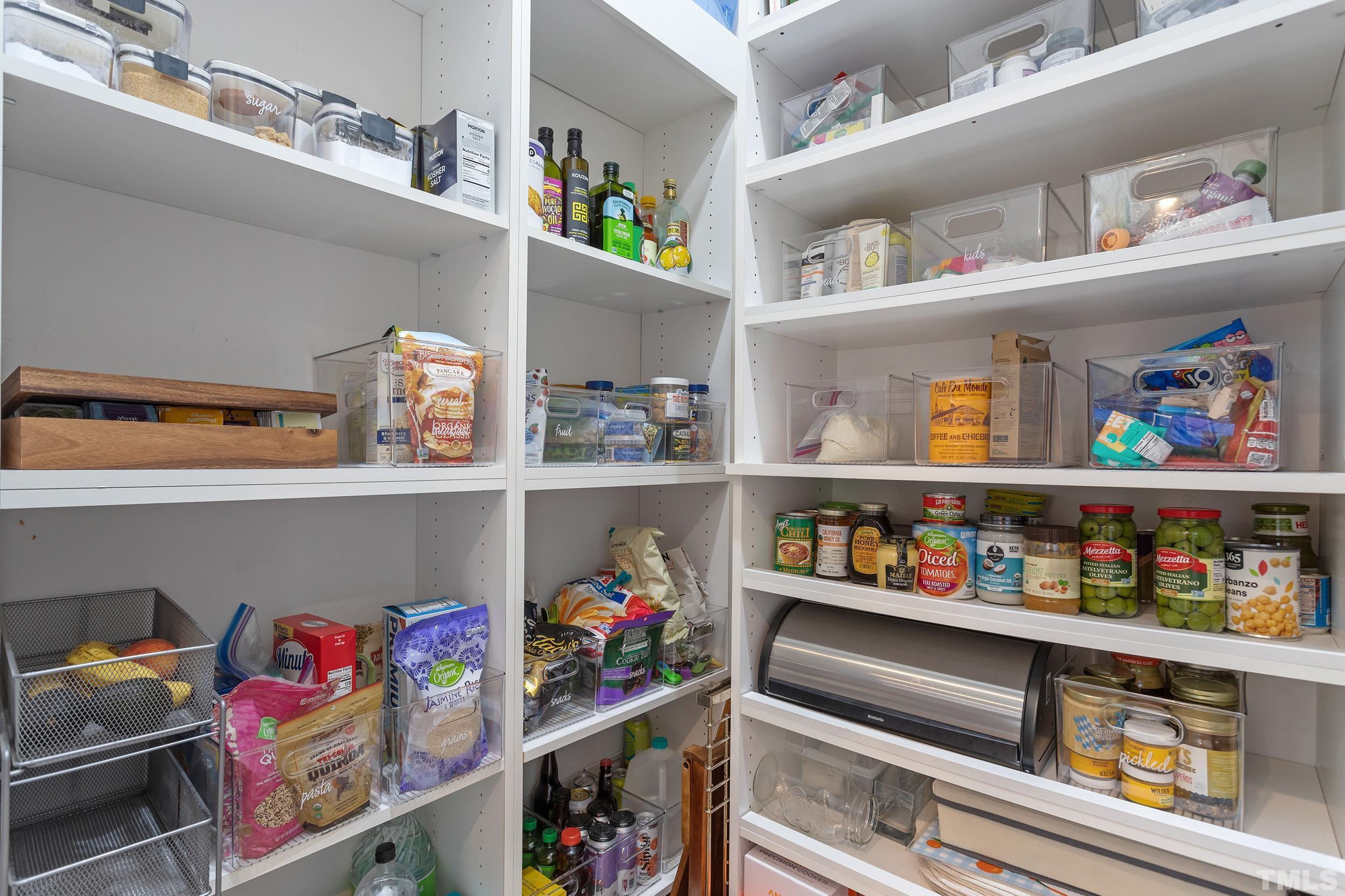 2511 Beechridge Road Raleigh, NC 27608 - Photo 20 of 45 a room with toys and storage racks on the wall