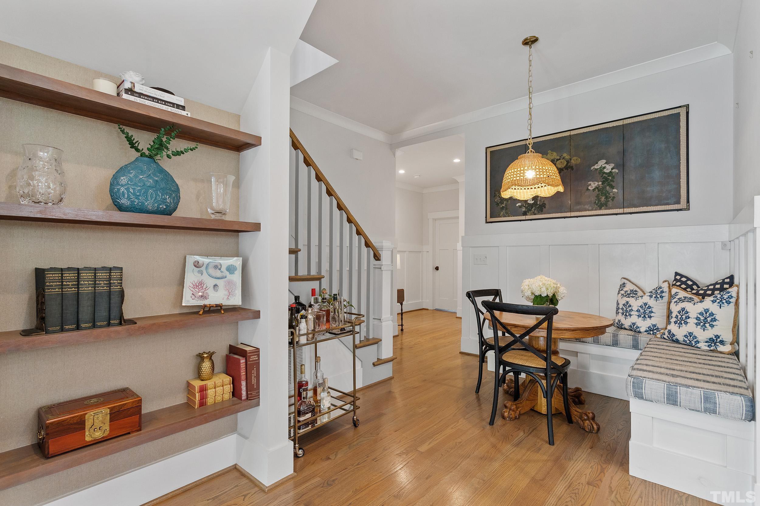 2511 Beechridge Road Raleigh, NC 27608 - Photo 25 of 45 a dining room with furniture and wooden floor