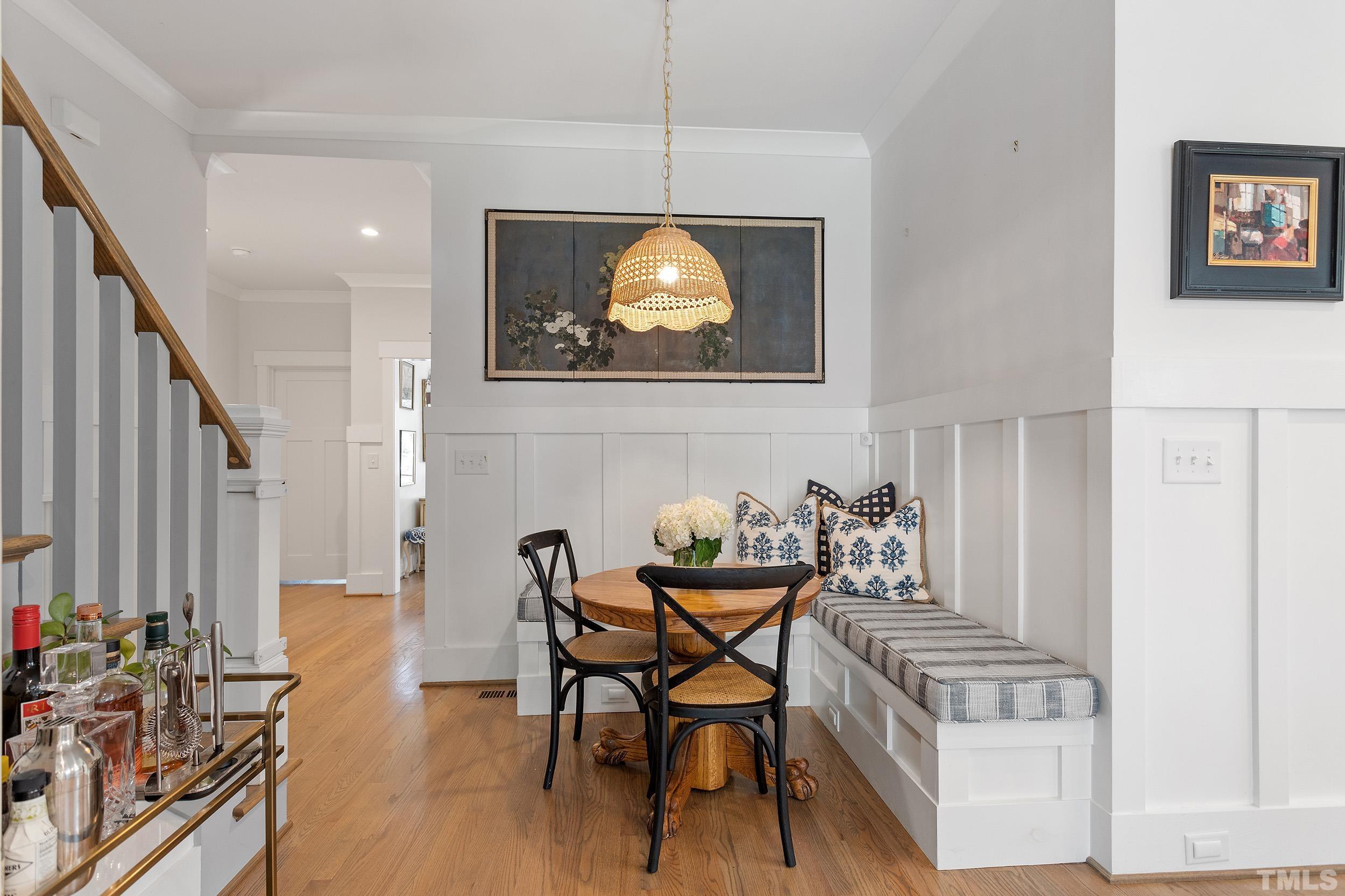 2511 Beechridge Road Raleigh, NC 27608 - Photo 26 of 45 a dining room with furniture and wooden floor