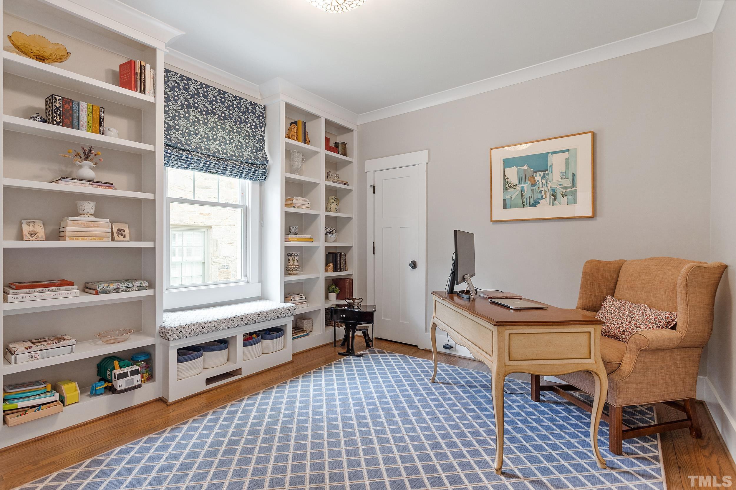 2511 Beechridge Road Raleigh, NC 27608 - Photo 27 of 45 a room with furniture and a window