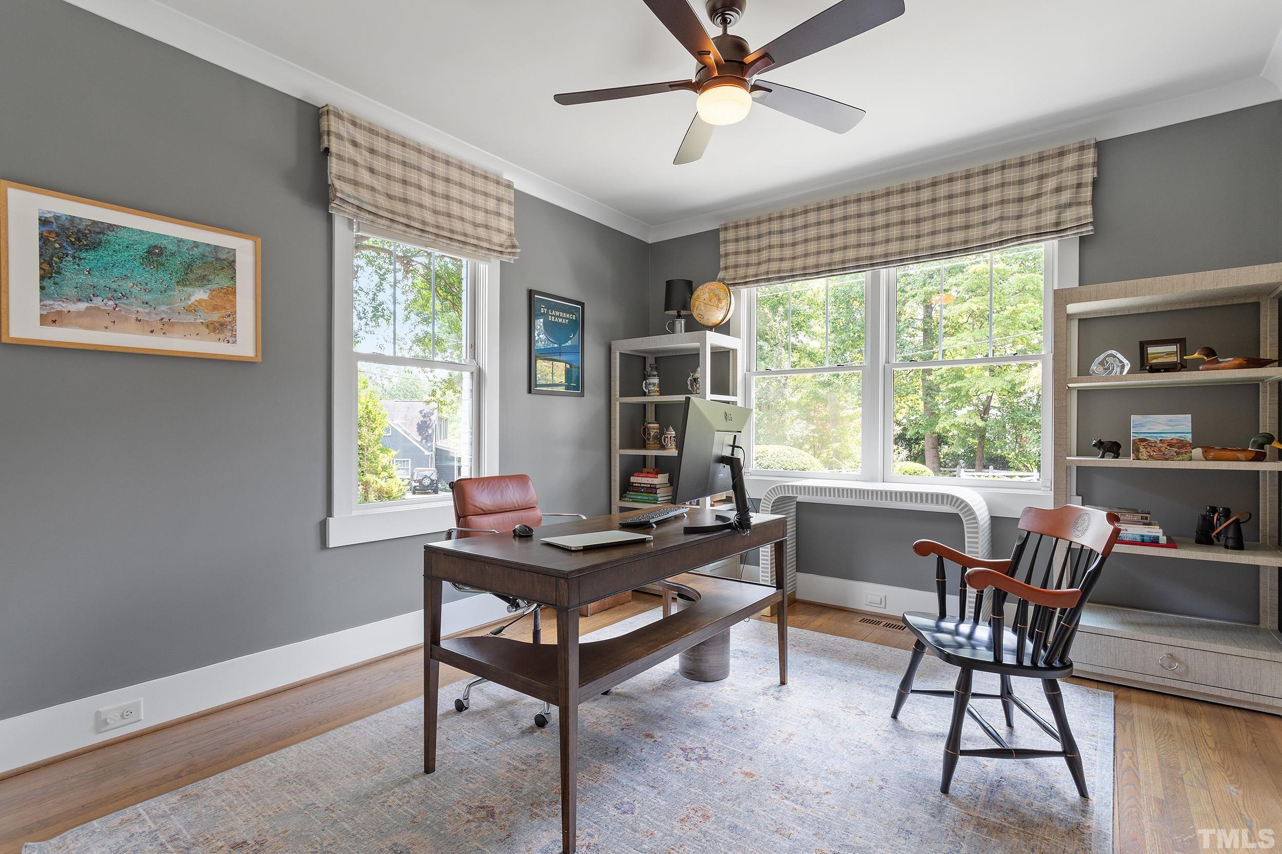 2511 Beechridge Road Raleigh, NC 27608 - Photo 28 of 45 a view of a workspace with furniture and a window