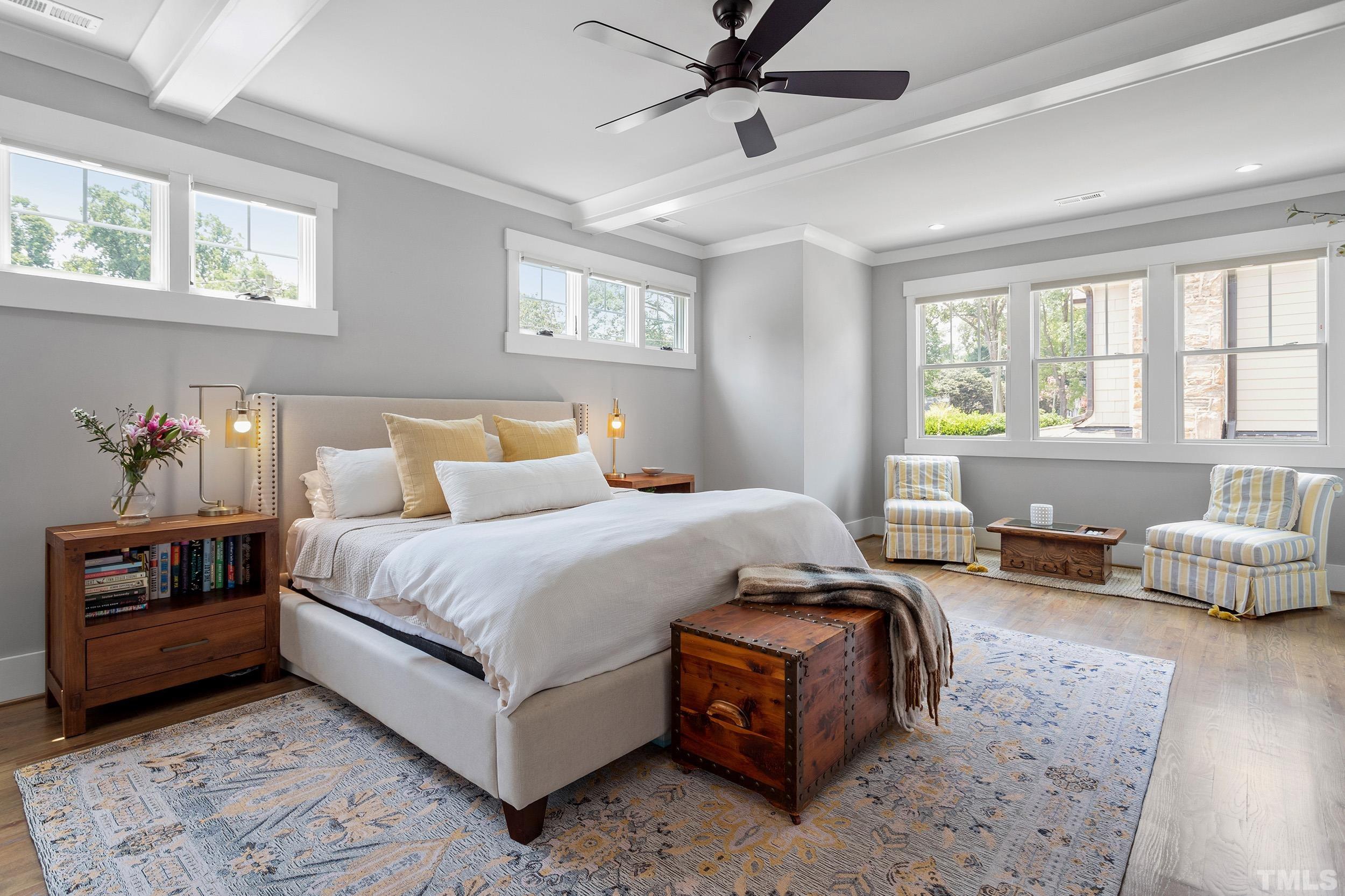 2511 Beechridge Road Raleigh, NC 27608 - Photo 31 of 45 a bedroom with a bed couch and a window
