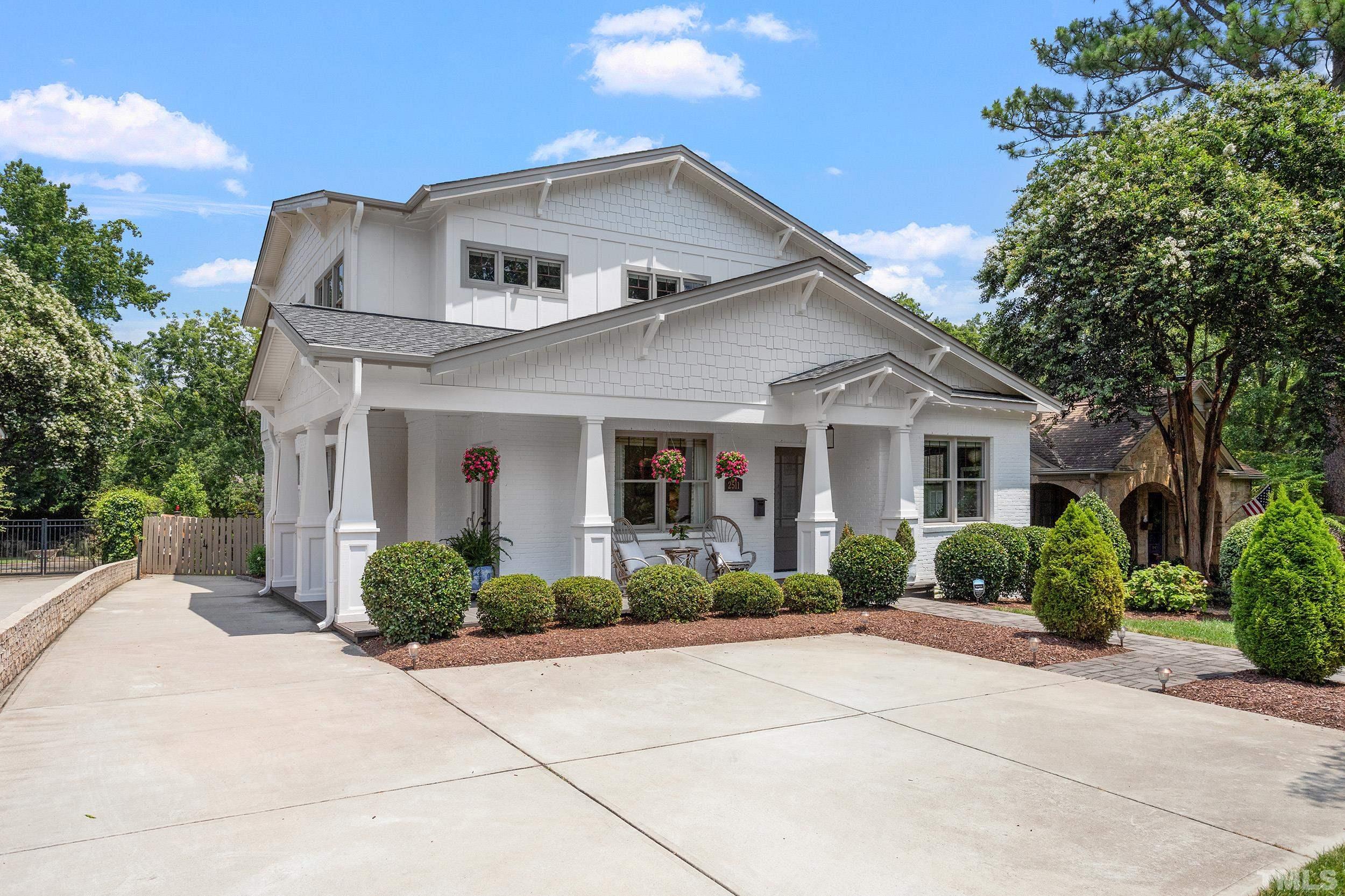 2511 Beechridge Road Raleigh, NC 27608 - Photo 4 of 45 a front view of a house with garden